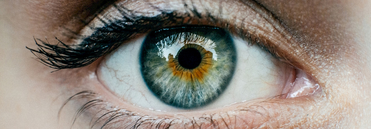 Woman with glasses trying to read